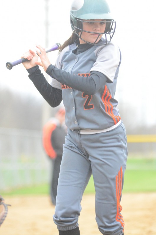 Karly Jones takes an inside pitch versus Goshen Wednesday. The Warsaw sophomore blasted a three-run homer in an 8-0 NLC win.
