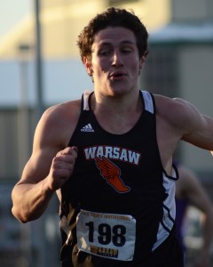 Gabe Furnivall competes in the 400 for champion Warsaw Friday night (Photo by Jim Harris)