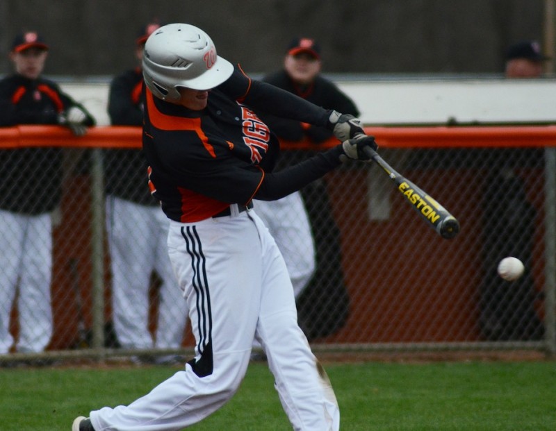 Senior Jason Ferguson connects for a big hit for Warsaw Wednesday. Ferguson drove in four runs in a 9-1 win over Goshen.