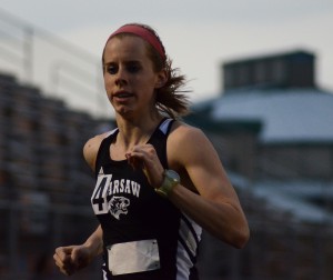 Senior Sarah Ray cruises to a victory in the 3,200-meter run Tuesday night for host Warsaw.