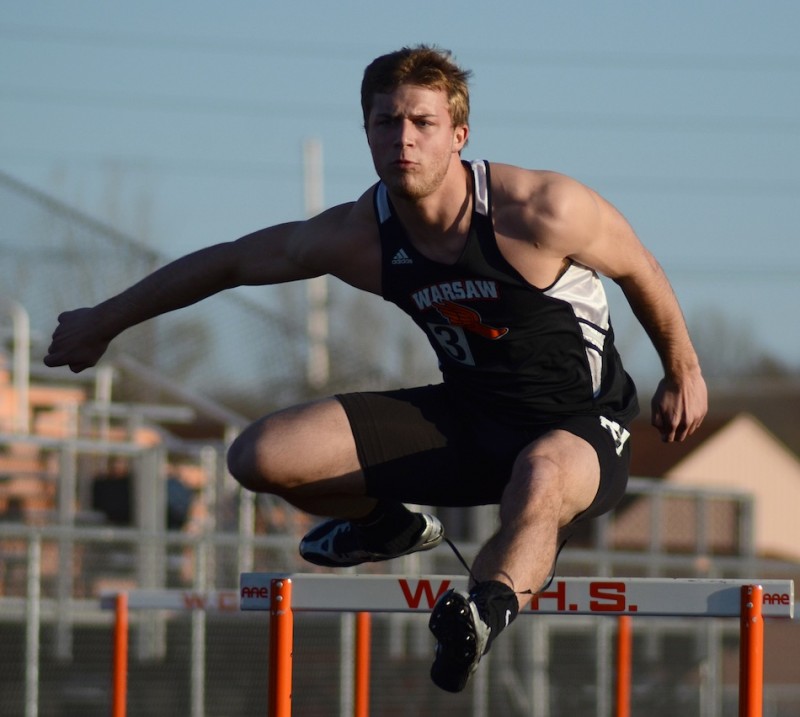 Taylor Cone competes earlier this week for Warsaw. Cone and the Tigers look to repeat as champions Friday night.