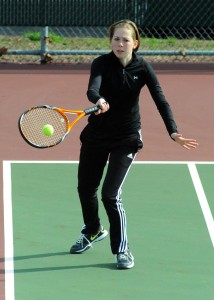 Marley Smith of Warsaw returns a shot during the one doubles match.