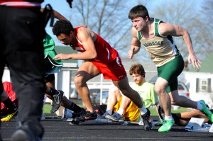 Wawasee's Michael Pena breaks out of the blocks at the start of the 100-meter dash against Goshen and Concord. (Photos by Mike Deak)