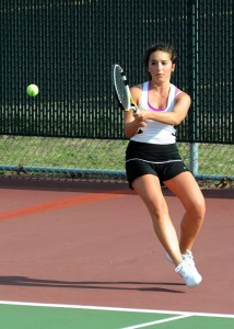 Warsaw's Jacqueline Sasso rips during two singles play.