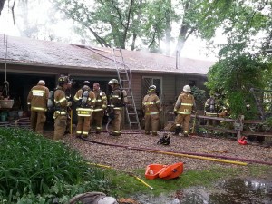 Atwood and Warsaw firefighters responded to an attic fire just before 9:30 a.m. this morning at 2471 N. Lake Breeze Dr. at Hoffman Lake. (Photo by Alyssa Richardson)