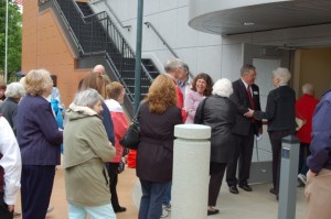 Warsaw Common Council President Diane Quance, left, and Mayor Joe Thallemer welcome residents to an open house and celebration in honor of the completion of renovations to the new home of Warsaw City Hall. (Photo by Jodi Magallanes)