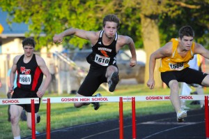 Taylor Cone of Warsaw flies through the 300 hurdles.
