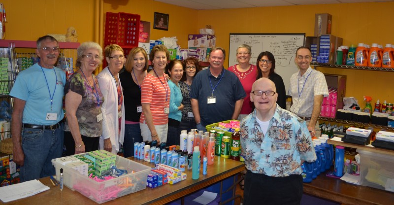 Curt Gatke, pictured in front, is a regular contributor to the Community Closet, which provides toiletries and cleaning supplies to those in need. (Photo by Stacey Page)