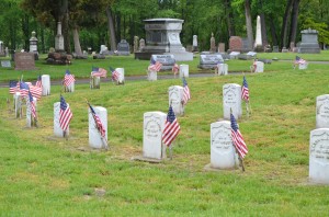 Veterans graves are marked with American flags at Warsaw's Oakwood Cemetery for Memorial Day.