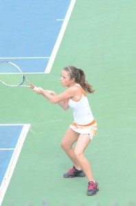 Sarah Boyle completes a backhand return during her No. 1 singles match Monday at Goshen.