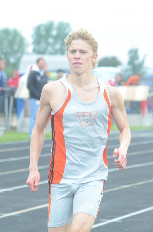 Jake Poyner won regional titles in both the 1,600 and the 3,200 for Warsaw Thursday night (Photo by Scott Davidson) 