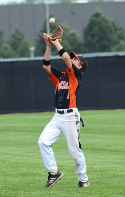 Josh Frantz gloves a popout for Warsaw during the Tiger Invitational Saturday.