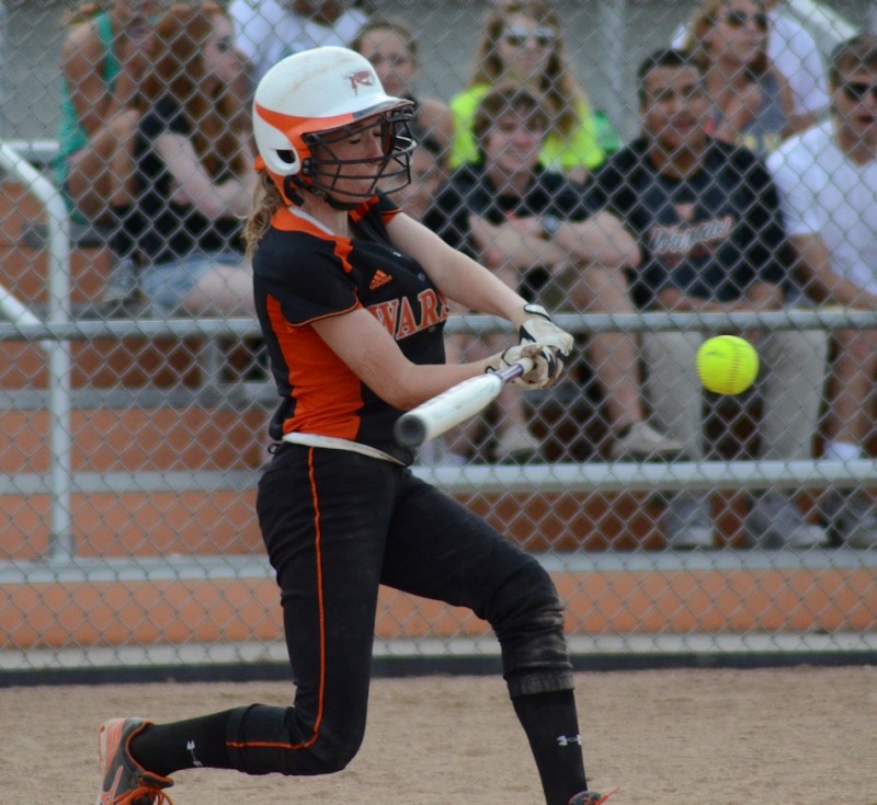 Warsaw's Kara Dishman takes a cut in a recent game. The Tigers topped Plymouth 3-1 Monday night in NLC action (File photo by Jim Harris)