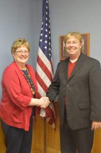 Rebecca Alles the new Van Buren Township Trustee is congratulated by County Republican Chairman Randy Girod