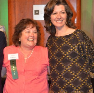 Cathy Fox, center, is shown with Amy Grant, Grammy award winner after receiving the Education Award