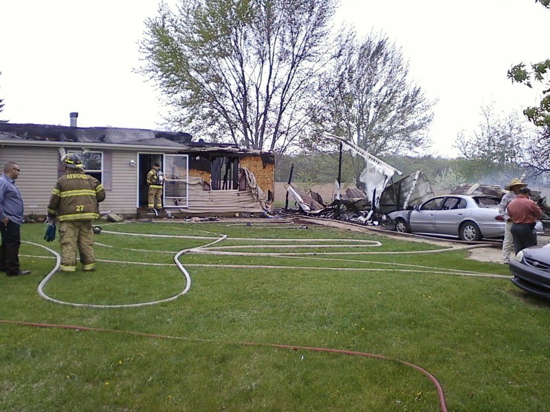 A fire started in a garage of an Atwood home Sunday afternoon destroying the garage and causing heavy damage to the home.