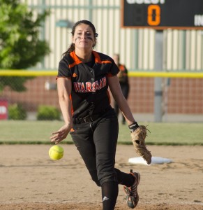 Junior Kaleigh Speicher lets fly with a pitch in sectional semifinal action Wednesday night in Warsaw.
