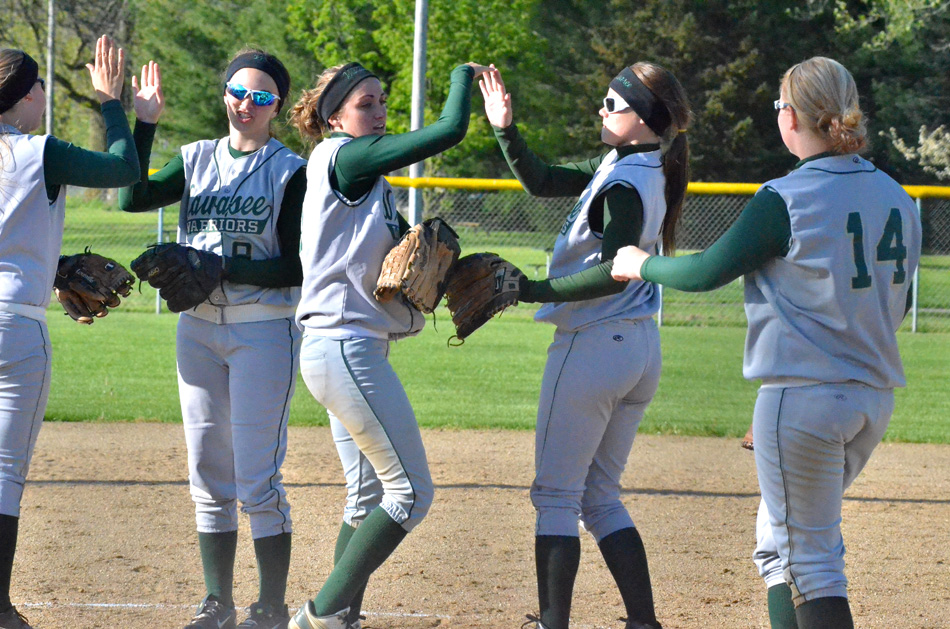 Wawasee's infield celebrates during a 3-1 win at Goshen. From left to right are Kylee Rostochak, Alli Ousley, Kylie Norris, Taylor Spangle and Madi Anderson.