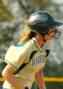 Wawasee's Ashlynn Fisher tracks her single in the second inning.