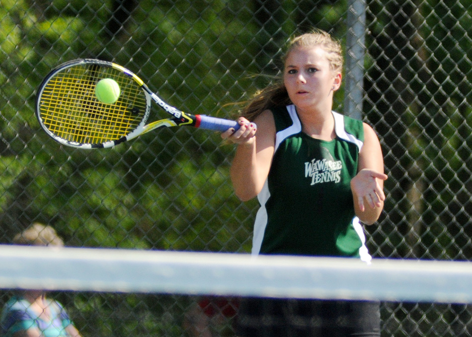 Wawasee's Esther Hermann concluded her first NLC Girls Tennis Championships with a win over Warsaw's Sarah Boyle Saturday afternoon. (Photos by Mike Deak)