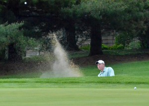 Wawasee's Jeffrey Moore blasts out of the sand during his round at the NLC.