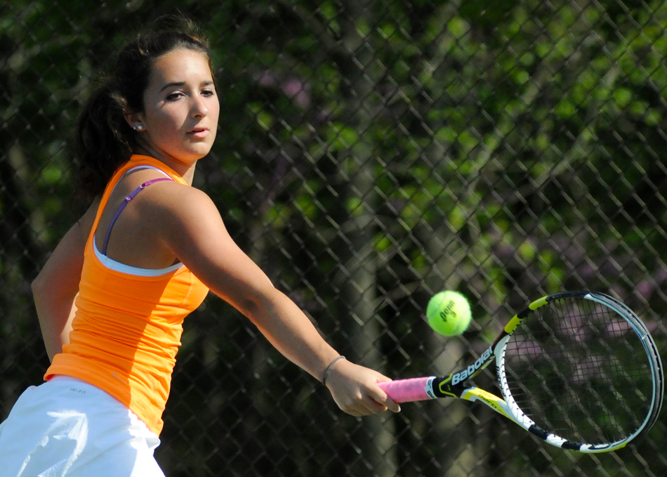 Warsaw's Jacqueline Sasso picked up a win Friday against Wawasee's Katy Ashpole in the second round of the NLC Girls Tennis Tournament. (Photos by Mike Deak)
