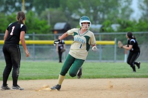 Wawasee's Taylor Spangle motors around second base en route of a triple.