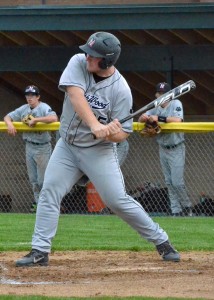 NorthWood's Trent Sellers begins the swing of an RBI hit in the win against Wawasee.