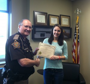 Elkhart County Sheriff Brad Rogers award Breann Hall with the Indiana Sheriff's Association scholarship. (Photo provided)