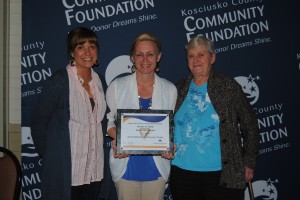 The North Webster Community Center received the The Non-profit Award at tonight's Heart of Gold Awards in Warsaw. Pictured, accepting the award, from left, are Jessica Hardy, Leah Gamble and Connie Adams. (Photo by Phoebe Muthart) 