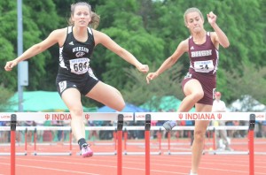 Jackie Ferguson competed in the prelims of the 300 hurdles for Warsaw at the State Finals.
