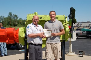 (From left) Mitch Ousley, Diesel Power Machine shop foreman, presenting the scholarship award to Tanner Dickerhoff. (Photo provided)