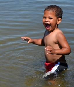 Elijah Joseph King, 3 years old, and his great-grandfather Bill Park, of Warsaw, spend the day enjoying the cool waters and sunshine at Center Lake, Warsaw. 
