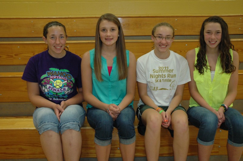 Wawasee Middle School eighth-graders who maintained straight A’s on all report cards during their three years of middle school. From left are Riley Kunkle, Madison McBride, Bridgette Yoder and Paige Miller. (Photo by Tim Ashley)