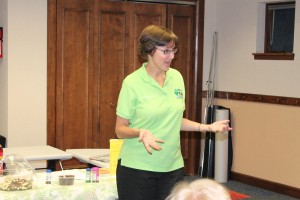 Shelly Heckert, a presenter from KC Recycling Depot, came to the Syracuse Library on Wednesday, June 19. She talked to teens about the role of pollution on the aquifer. Heckert instructed the young people in building a model aquifer made with chocolate chips, ice cream and soda. One of the participants said they had no idea that having clean drinking water was so complicated. She gave two bird houses as prizes for the winners of the environmental Bingo game. (Photo provided)