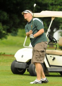 Nate O'Connell attempts a chip shot during play at the 2013 Wawasee Warrior Open. (Photo by Mike Deak)