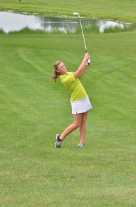 Wawasee's Elizabeth Jackson goes for the green on number four at South Shore. Jackson finished with a 48 on the night.