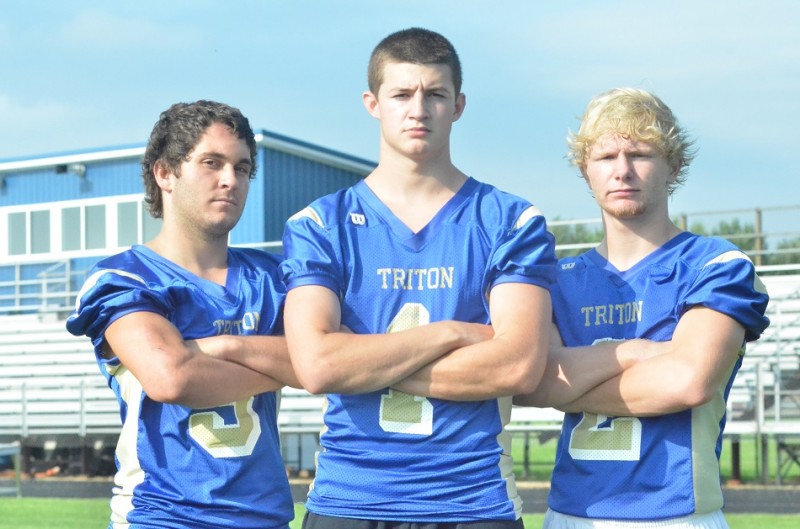 Pictured from left to right are Trojan senior captains Josey Farmwald, Jayden Mosier and Cole Creighbaum. 