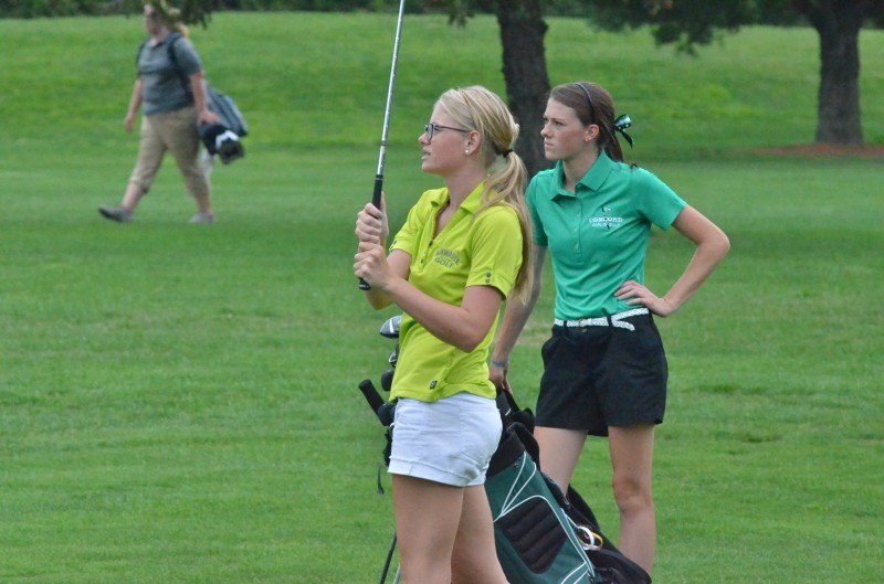 Wawasee's Courtney McDaniel and Concord's Olivia Kauffman both look on with uncertainty at McDaniel's shot on number nine Thursday evening. Both players finished with a 52. (Photos by Nick Goralczyk)