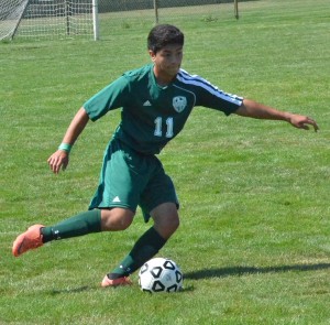 Wawasee's Javier Lopez looks to pass Saturday morning against Concord.