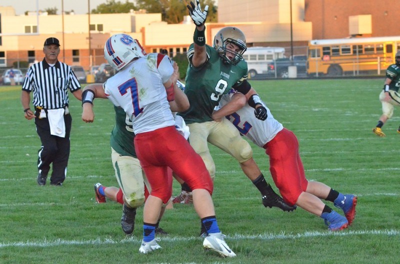 Wawasee's Braxton O'Haver nearly bats down a pass from Whitko's Ethan Nicodemus.