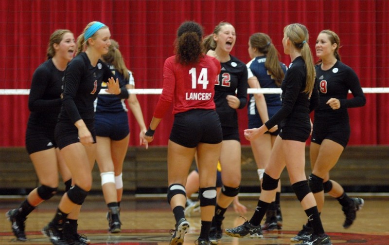 The Grace College volleyball team celebrates during a 3-0 home win over Spring Arbor Friday night (Photo provided by Grace College Sports Information Department)