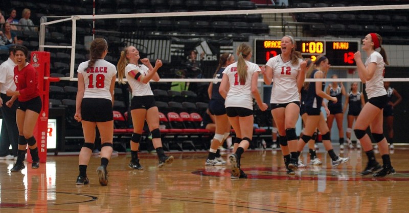 The Grace College volleyball team celebrates during a 3-0 home win over Mount Vernon Nazarene Tuesday night (Photo by Seth Elliott)