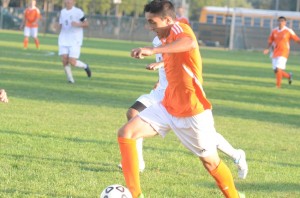 Zach Tucker makes a run early in the game Wednesday for Warsaw.