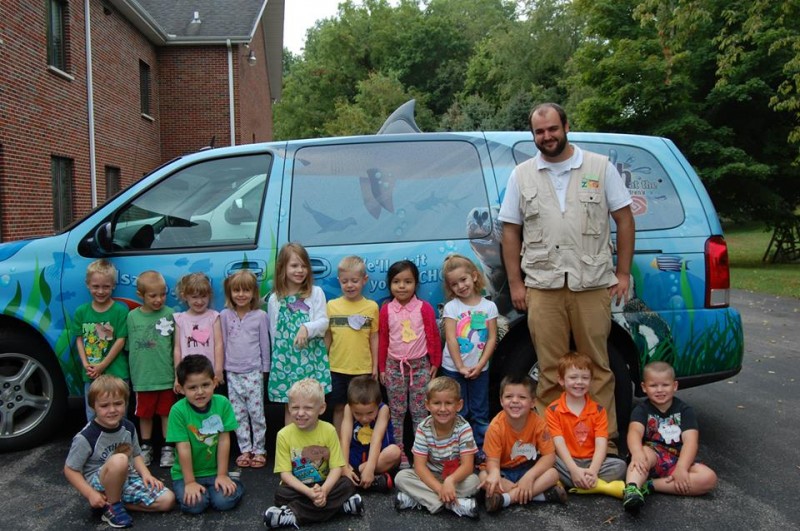 Front row (from left): Bennett Wiebe, Gael Montellano, Clarke Thompson, Shane Fitzgerald, Jacob Timmerman, Logan Botts, Brayden Nelson and Preston Eskridge.  Back row: Parker Northern, Kevin Gough, Amy Joy, Caitlin Uthgenannt, Isla Rose, Brady James, Nayli Bautista, Brooklyn Brubaker and Jon of the Fort Wayne Children’s Zoo.  (Photo provided)