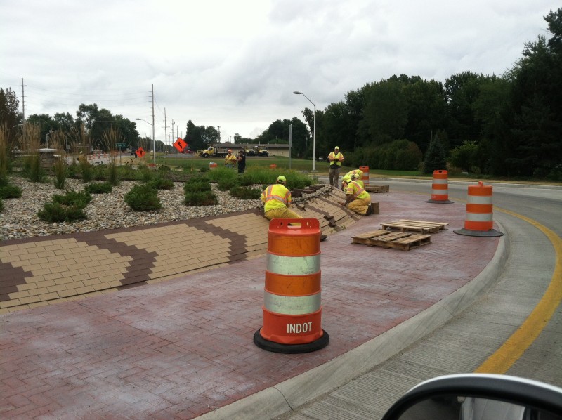 Engineers have begun removing bricks from the Zimmer Road roundabout to determine why the design is failing. (Photo provided by Tim Ellis)