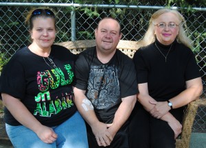 Matt Mawer of Warsaw is in need of a kidney transplant and is currently on dialysis. Mawer, middle is pictured with his fiancee, Becky, left, and his mother, Pam, right. (Photo by Phoebe Muthart)