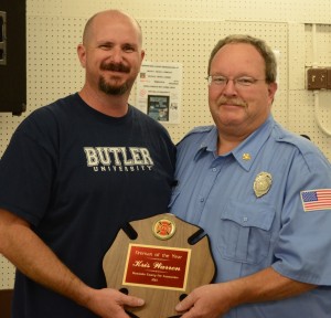 Kris Warren of Mentone, left, was named the Firefighter of the Year during the annual Kosciusko County Firemen's Association fish fry. He is pictured with Kevin McSherry, president of the association. (Photo by Stacey Page)