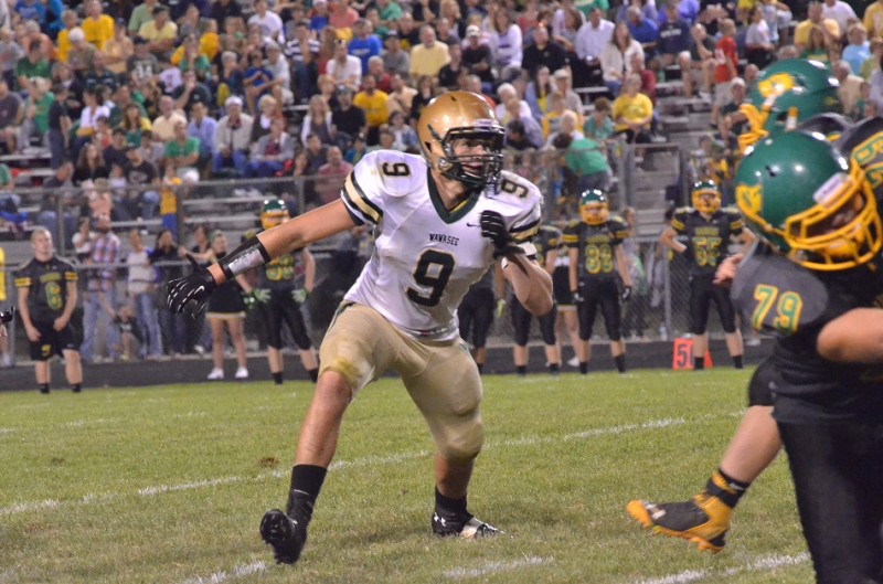 Wawasee's Braxton O'Haver looks to make a big play for the Warrior defense in Friday's game.