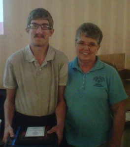Area 5 Special Olympics Athlete of the Year, Kirk Conrad, is pictured with Becky Walls, Kosciusko County coordinator of the program. (Photo provided)